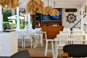 A restaurant or other place to eat at MyElla Boutique Hotel