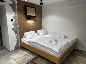 Postel nebo postele na pokoji v ubytování Csipetnyi Chill Vendégház