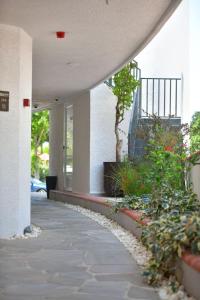 A garden outside MyElla Boutique Hotel