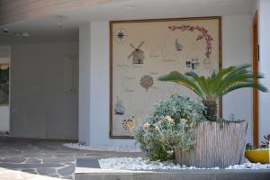 A garden outside MyElla Boutique Hotel