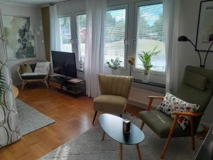 Χώρος καθιστικού στο Vacation Home VillaKvill