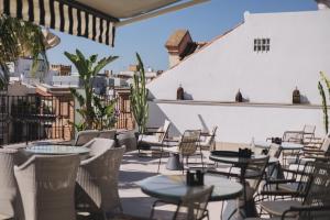 Un restaurante u otro lugar para comer en Intelier Casa de Indias