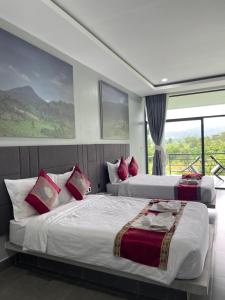 Giường trong phòng chung tại Hidden Leaf Resort