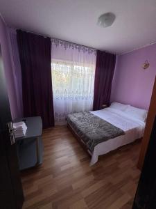 Ένα ή περισσότερα κρεβάτια σε δωμάτιο στο Apartament Cristo y Maria