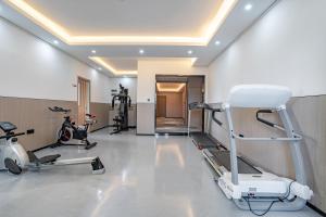 Tianmin Holiday Hotel Tianhe Dongpu Olympic Sports Center健身房和／或健身器材