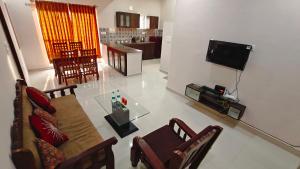 TV a/nebo společenská místnost v ubytování Dream Haven Pool Villa