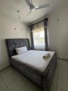 Postel nebo postele na pokoji v ubytování Buxton Point Kandy Three Bedroom Family House