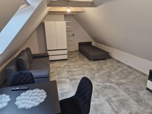Χώρος καθιστικού στο Apartament w Centrum
