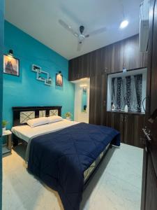 Ένα ή περισσότερα κρεβάτια σε δωμάτιο στο Prime stay in heart of Hyderabad