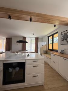 Kuchyňa alebo kuchynka v ubytovaní ApartSki 18d
