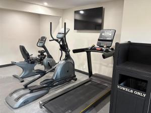 a gym with two exercise bikes and a television at Best Western San Diego Pacific Beach/Mission Bay in San Diego +5 photos