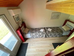 Postel nebo postele na pokoji v ubytování Paatsalu Sadam