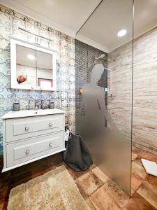 a bathroom with a sink and a shower at Holiday Home Virida, app Leopold III in Ivančna Gorica +22 photos