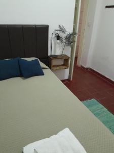 Katil atau katil-katil dalam bilik di Casa Centro JH +5 gambar