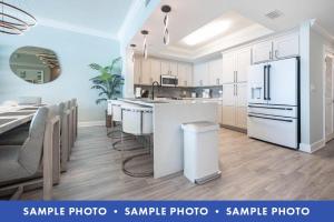 Kuchyň nebo kuchyňský kout v ubytování Phoenix Gulf Shores II 2002 condo