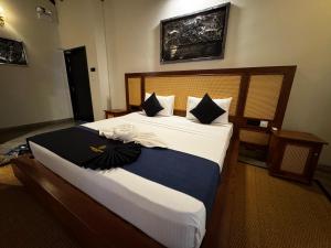 Postel nebo postele na pokoji v ubytování Foresta Resort Sigiriya