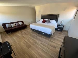 Un pat sau paturi într-o cameră la Rome en ValQuirico