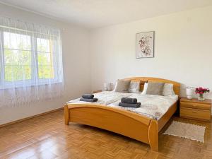 Ένα ή περισσότερα κρεβάτια σε δωμάτιο στο Apartmen Rose