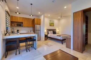 Η κουζίνα ή μικρή κουζίνα στο Meditation Haven 1BR Condo Choya +46 φωτογραφίες