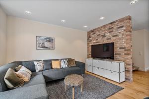 TV a/nebo společenská místnost v ubytování Wellenzeit Ferienhaus Wellenzeit