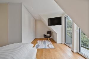 Postel nebo postele na pokoji v ubytování Wellenzeit Ferienhaus Wellenzeit