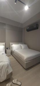 Ein Bett oder Betten in einem Zimmer der Unterkunft La Residence Panamá