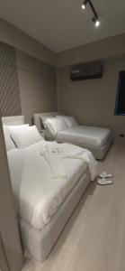 Ein Bett oder Betten in einem Zimmer der Unterkunft La Residence Panamá