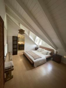 En eller flere senge i et værelse på L'abri Côtier - Appartement duplex 2 chambres