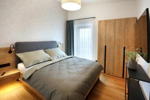 Postel nebo postele na pokoji v ubytování Apartmány Horizont