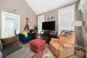 a living room with a couch and chairs and a tv at The Pronghorn - 97 Butternut in Cherry Valley +85 photos
