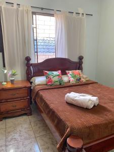 Triana Guest House客房内的一张或多张床位