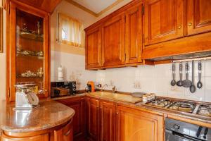 Kuchyň nebo kuchyňský kout v ubytování Il Rifugio della Regina - Casa con Patio + 22 fotografií