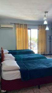 Triana Guest House客房内的一张或多张床位