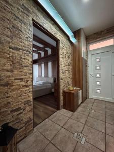 Postel nebo postele na pokoji v ubytování Angéla Apartman + 12 fotografií