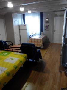 a room with two beds and a large window at Аренда посуточно море 2-12 человек Одесса Крыжановка in Kryzhanivka