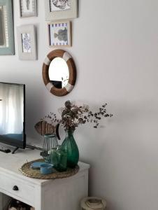 Televízia a/alebo spoločenská miestnosť v ubytovaní Buenavista Home Moncofar