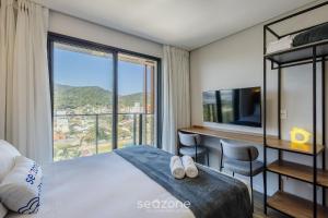 TV a/nebo společenská místnost v ubytování Estúdios c/ Vista Lateral Mar no Penha Spot | PSO - L