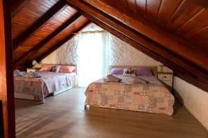 Ένα ή περισσότερα κρεβάτια σε δωμάτιο στο Vila Rocco +27 φωτογραφίες