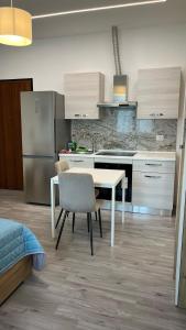 Kuchyň nebo kuchyňský kout v ubytování Luca's House Bergamo Orio