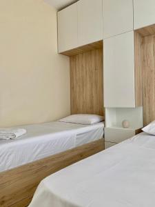 Fotografie z fotogalerie ubytování Curri Apartment in Twin Tower- modern Apartament 4 people, 3 min from the Beach v destinaci Shëngjin