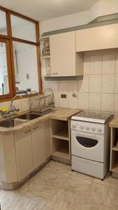 Η κουζίνα ή μικρή κουζίνα στο Apartamentos Sercan +10 φωτογραφίες