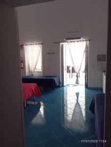A bed or beds in a room at Da Lucia - Alloggio turistico Santa Maria