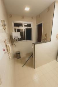 Køkken eller tekøkken på Cobertura - Praia do Morro