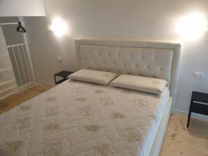 Postel nebo postele na pokoji v ubytování Casa Conero