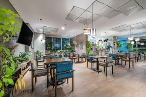 Εστιατόριο ή άλλο μέρος για φαγητό στο Urban 2505 - Oasis with pool and gym