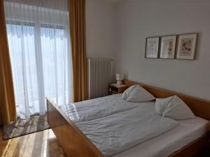 Voodi või voodid majutusasutuse Sonnenterrasse Klöcklschuster toas