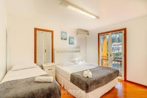 Postel nebo postele na pokoji v ubytování Apto 3 Quartos Vista p/ Montanhas RLU0302