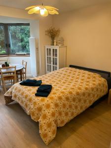 Ένα ή περισσότερα κρεβάτια σε δωμάτιο στο Cozy appart between Paris & Disney