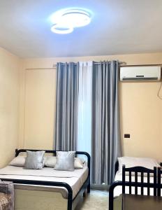Postel nebo postele na pokoji v ubytování Hotel Asteri