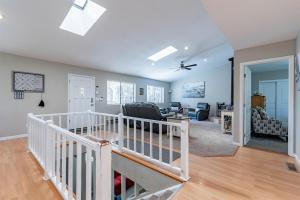 an open living room with a staircase in a house at New Listing - Cedar Escape -Close to Lakes & Golf in Show Low
